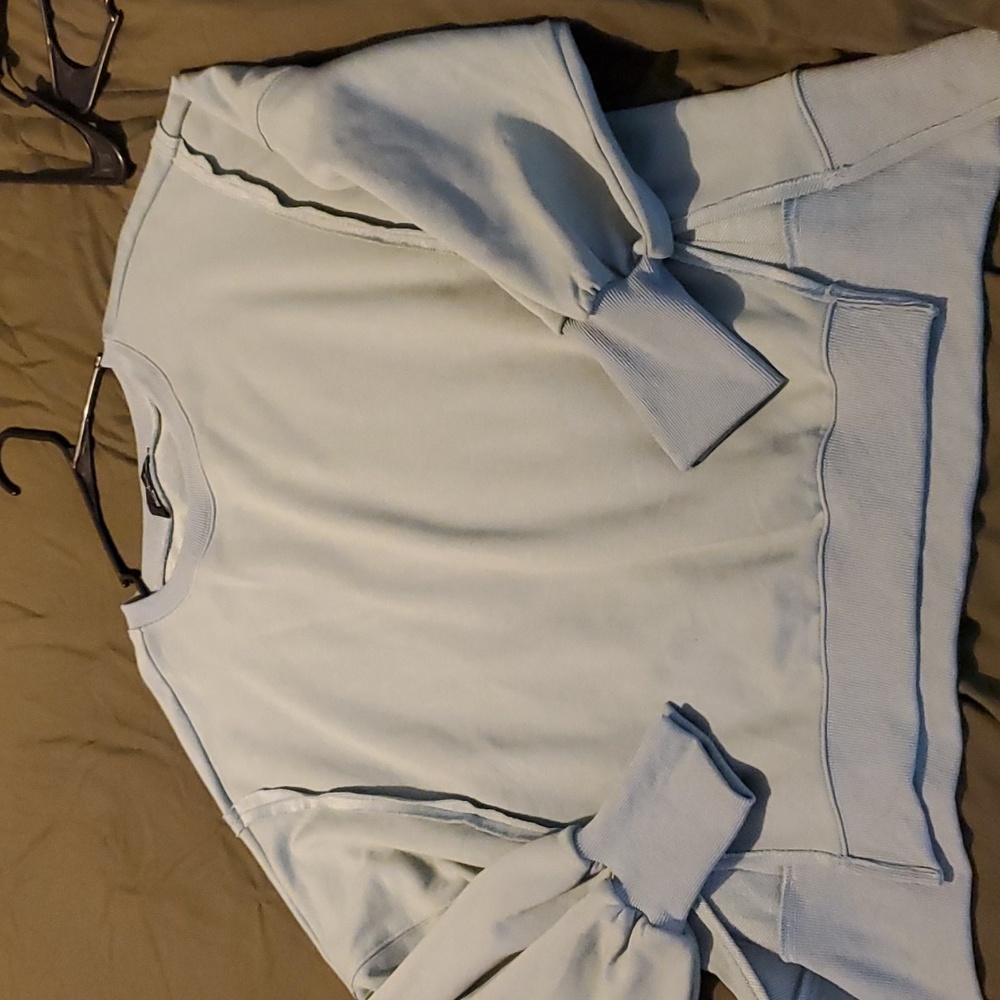 Light blue sweater